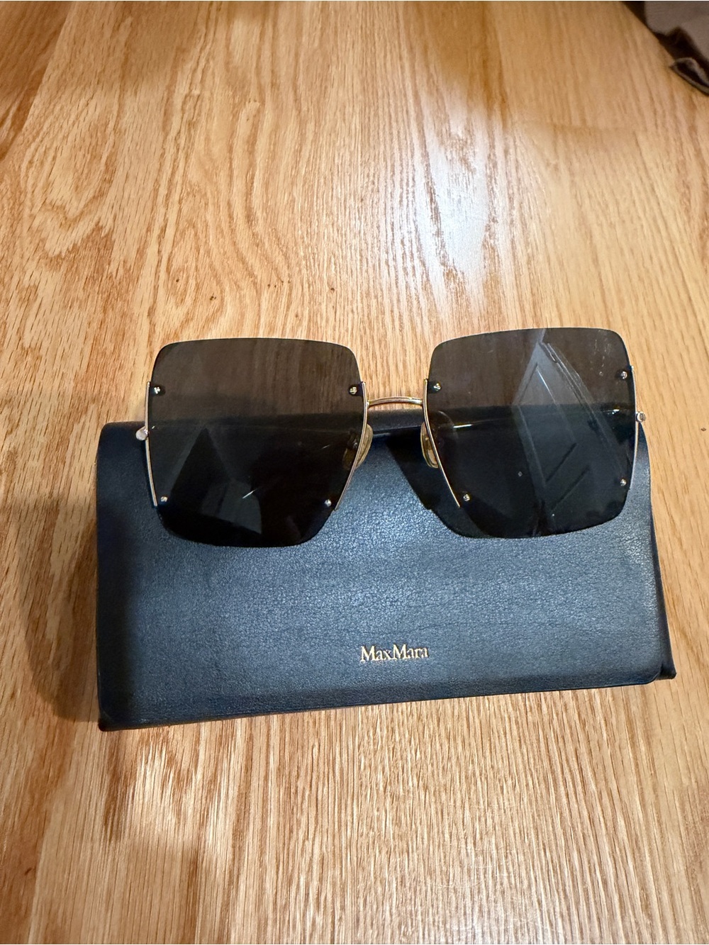 MaxMara Black Rimless Square Sunglasses with Gold Accents